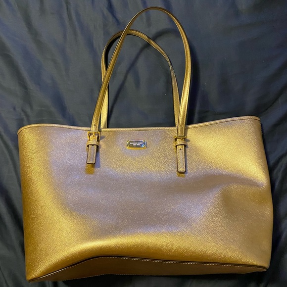 Michael Kors Handbags - EUC Michael kors gold XL tote bag